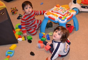 Playing together and making a mess in the basement.