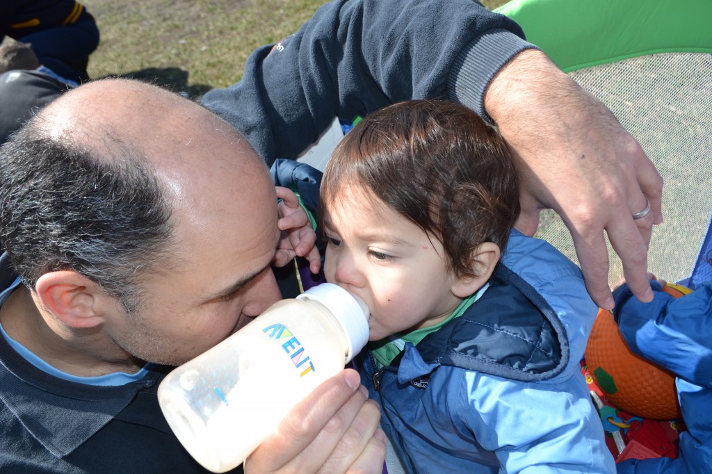 Adam feeding Aaron.