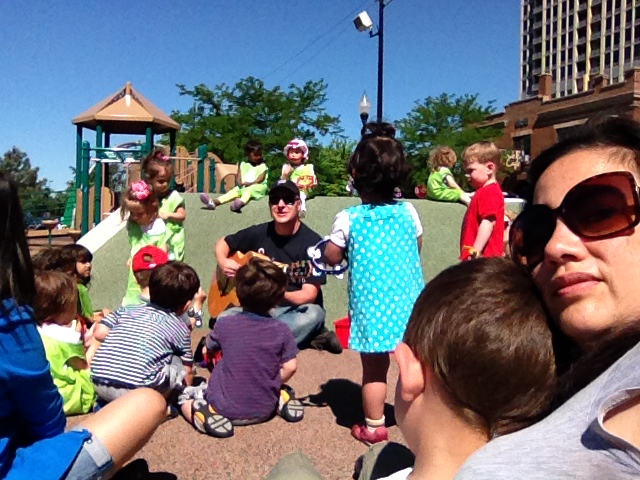 Not all bad, here was a nice surprise. A guy shows up and starts singing kids songs in the park.