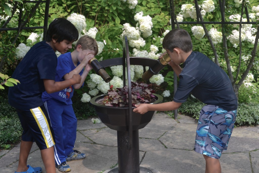 A spinning bowl of flowers and two telescopes makes for a cool kaleidoscope.