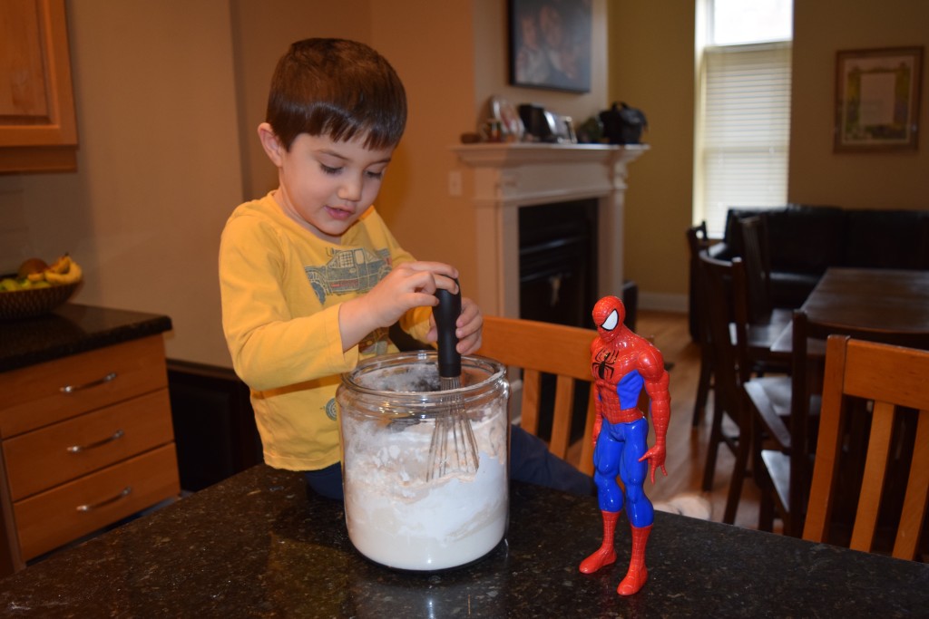 Sam helps mix the America's Test Kitchen Gluten Free All Purpose Flour