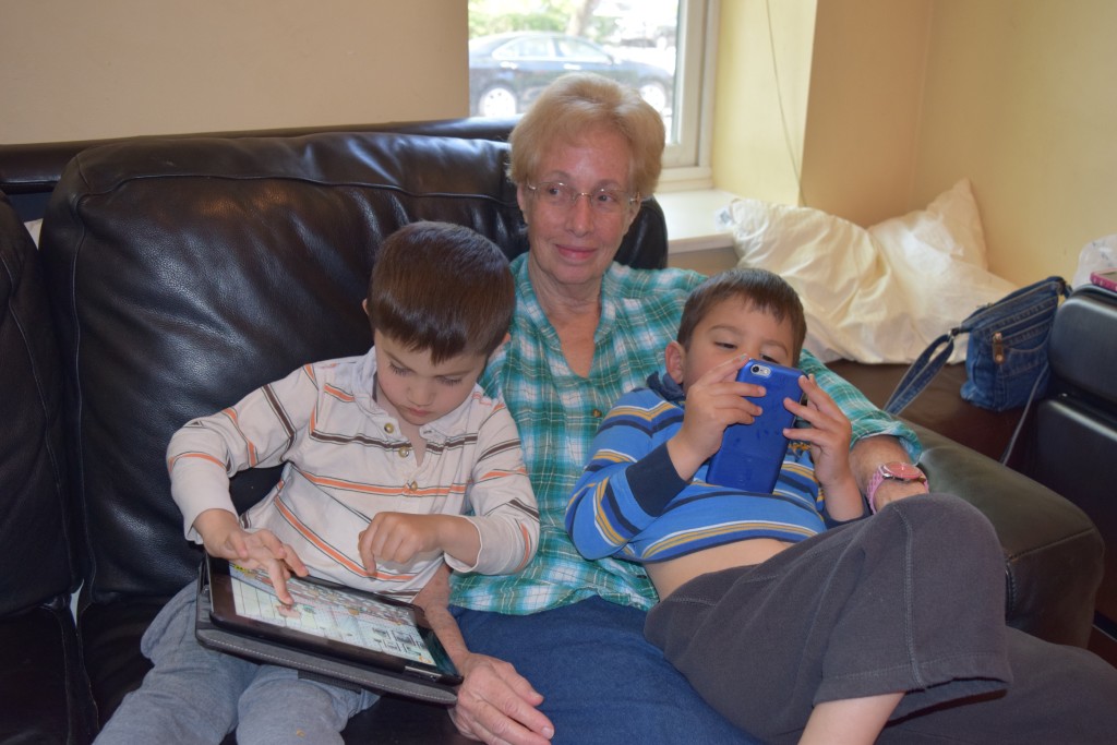 Sam and Aaron snuggle up to Auntie Doris.