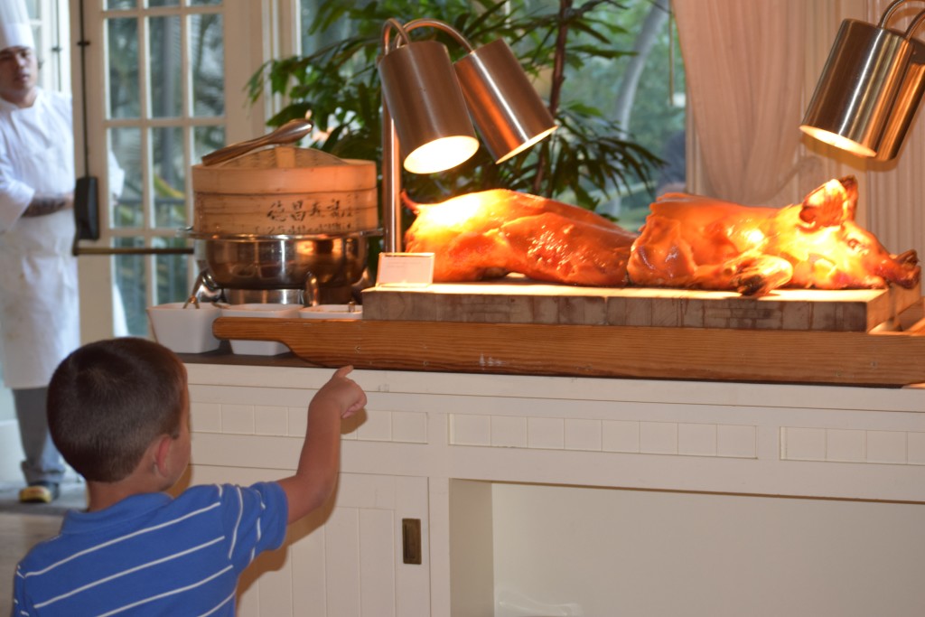 Aaron was fascinated by the full pig.