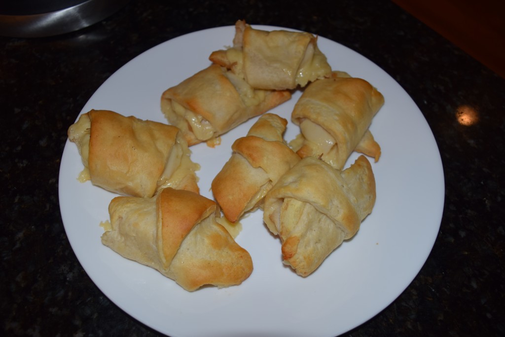 Apple slices with Cheddar and Turkey rolled in Crescent rolls.