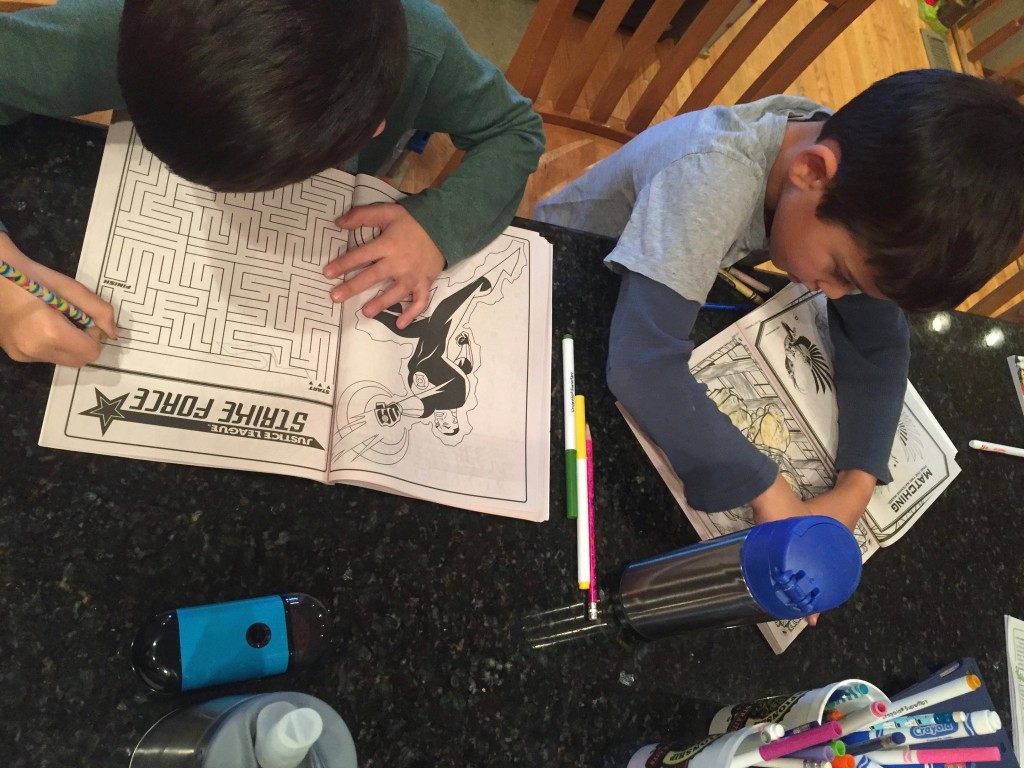 Aaron loves to color, Sam prefers the puzzles.
