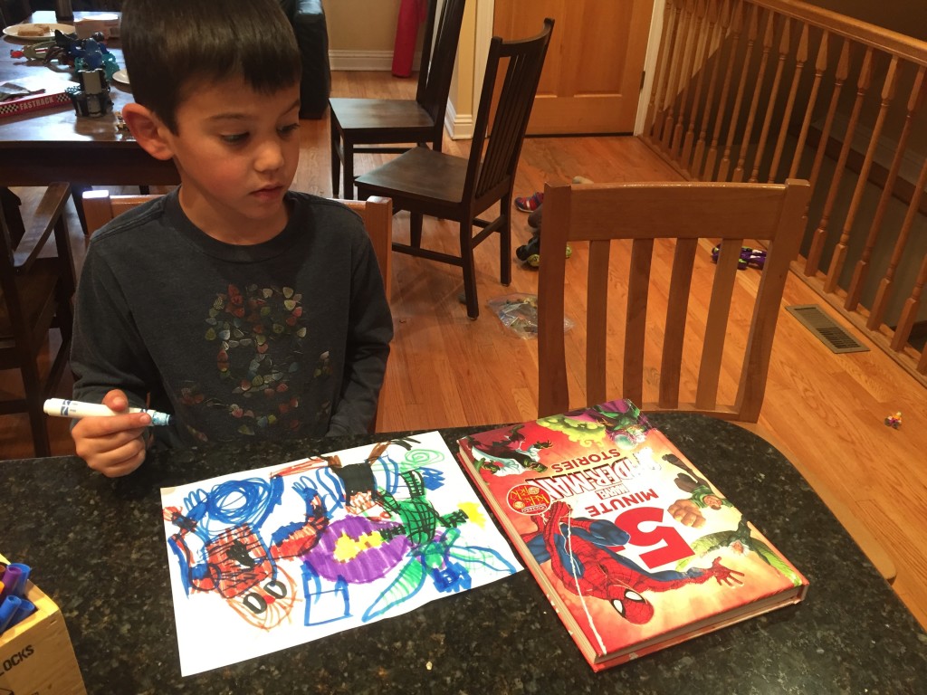 While I work in the kitchen, Aaron likes to hang out and draw.