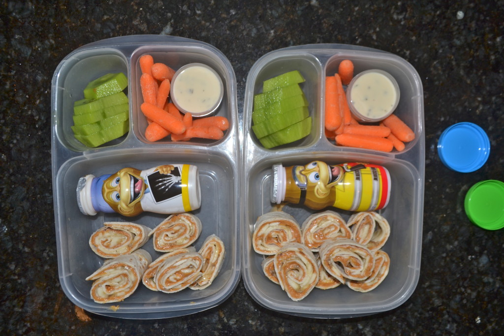 Peanut Butter and Banana roll ups, yogurt drink, carrots and ranch dip, kiwi.